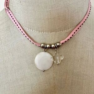 Marc Labat abalone pendant necklace on pink ribbon